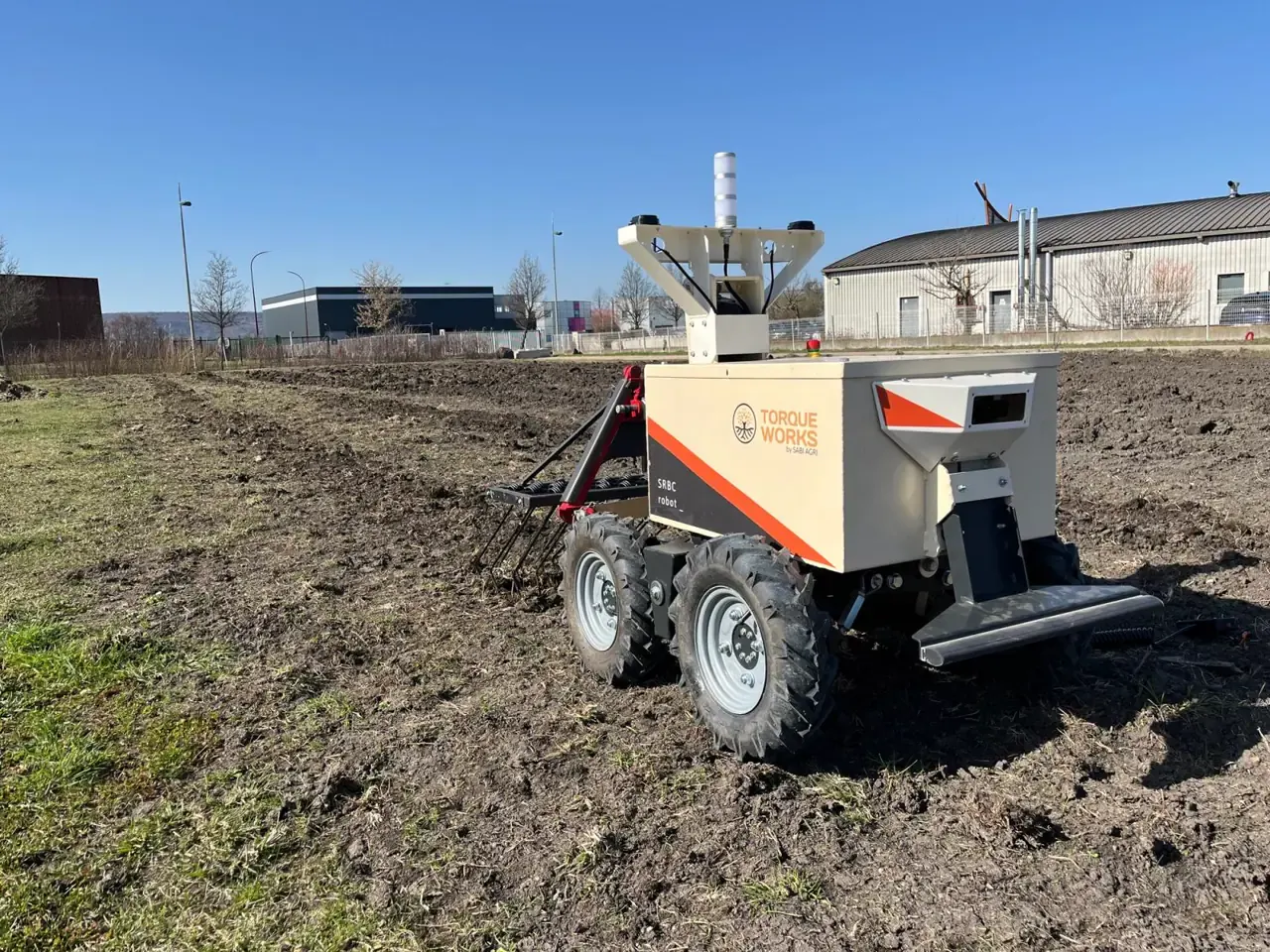 SABI AGRI SRBC four-wheel-drive robot in a field
